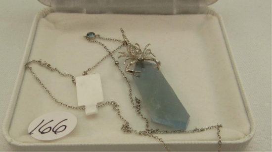 6.6ct Natural Aquamarine suspended from 18K w/g