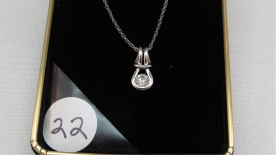 14K w/g Bezel set .50ct Diamond in a knot design
