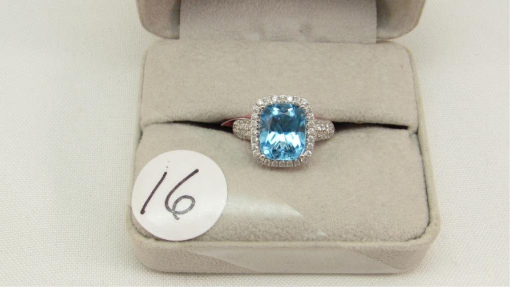 14K w/g 4.94ct Blue Topaz Ring with .65ct t.w. dia