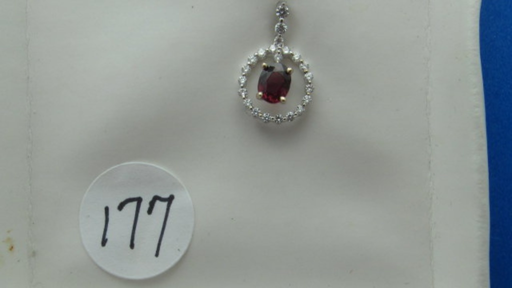 18K w/g .94ct Oval Ruby & .31ct t.w. Diamond