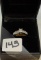 LADIES 18K W/G .33 PRINCESS CUT DIAMOND CENTER BAGUETTE SIDES .57CT T.W DIAMOND 3.2G