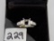 LADIES 14K W/G 2 EMERALD CUT SIDE DIAMONDS .36CT T.W. AND 10 PRINCESS CUT DIAMOND ALONG SIDE