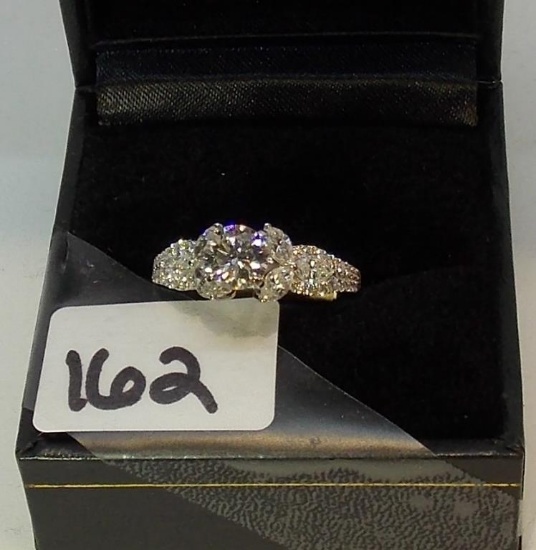 LADIES 18K W/G .95 ROUND CENTER DIA MOND 3 MARQUISE DIAMONDS ON EITHER SIDE AND PAVE DIAMONDS,