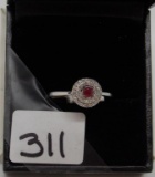 LADIES 14K W/G RUBY CENTER .12CT T.W. DIAMOND RING 2.1GR