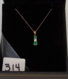 LADIES 14K Y/G .23CT T.W. EM, .10CT DIA 18