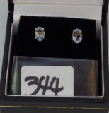 LADIES 14K Y/G OVAL BLUE TOPAZ STUD EARRINGS