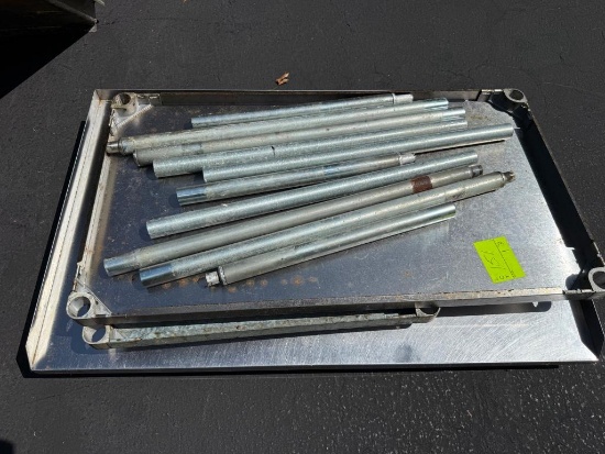 Stack of Commercial Stainless Steel Tables / Legs