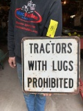 128 Tractors with Lugs Prohibited Sign