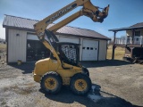 4123 John Deere 240 Skid Steer