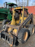 7119 New Holland L555 Skid Steer