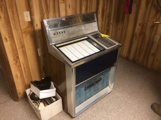16 1970's RockOla Jukebox with Box of 45's