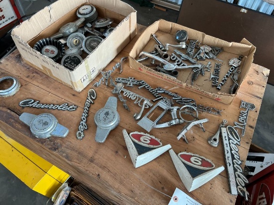 15 (2) Boxes of Emblems & Wheel Caps