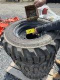 63 (4) Case 10-16.5 Tires on Rims