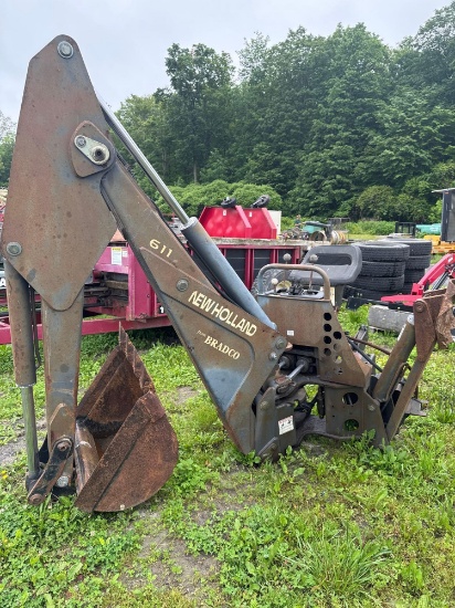 6525 New Holland from Bradco 611 SS Backhoe