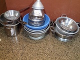 Lot of colanders and strainers