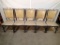 (5) Chairs - wood frame - beige vinyl back & seat