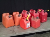 (5) 5-gallon fuel cans and (2) 2-gallon fuel cans - all are empty
