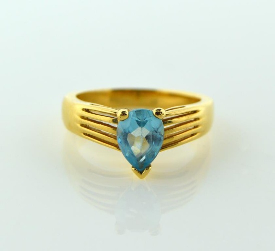 Ladies Size 5 Ring: 14K Yellow Gold, Blue Topaz Pear Solitaire