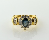 Ladies Size 6 Ring: 14K Yellow Gold, Blue Topaz Pear Solitaire, Diamonds