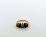 Ladies Size 4.5 Ring: 10K Yellow Gold, Oval Cut Tourmaline, Amethyst, Blue Topaz, Garnet, & Citrine
