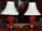 Pair of Oxblood Glaze Ceramic Vasiform Table Lamps, Cream Shades