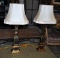 Pair of Black & Gold Painted Wooden Columnar Candlestick Table Lamps, Ivory Shades