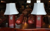 Pair of Red Lacquer and Antiqued Brass Clasp Hexagonal Table Lamps, Ivory Shades