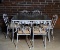 Vintage White Meadowcraft Wrought Iron Glass Top Patio Table & Six Chairs w/ Rush Cushions