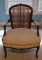 Carved Cherry Armchair w/ Caned Back Antique White Upholstery