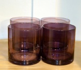 Four Amethyst Glass Tumblers