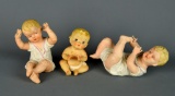 Lot of 3 Porcelain Piano Baby Figurines
