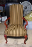 Attractive Upholstered Armchair, Gold & Black Upholstery