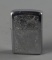 Vintage Zippo Lighter with Chased Design on Case