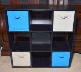 Black Nine Compartment Storage Shelf With 4 Blue or Tan Cloth Baskets