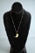 Claw Pendant 1.25”  Mounted in 9K Yellow Gold w/ 10K Gold 20” Chain, Chain Is 1.0 dwt