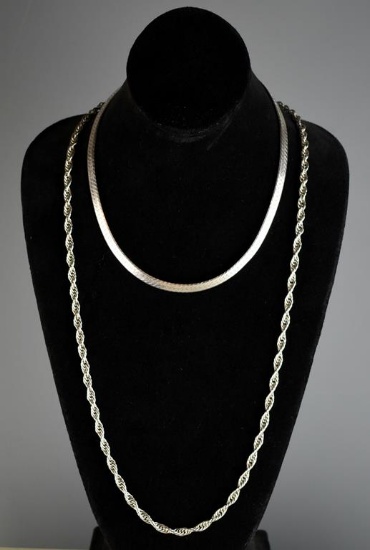 Lot of Two Sterling Silver Necklaces: 17” Herringbone and 28” Twist Chain (TW=61 g)
