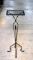 Charming Black Strap Metal Plant Stand with Glass Top