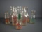 Lot of 8 Vtg. Milk Bottles w/ Graphics: Page, Sunnymeade, Sanford, Haskell's, Orchard Farm, Truax
