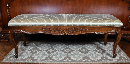 Elegant Carved Wooden Bench with Neutral Upholstered Seat