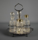 Vtg. Four Bottle Caster/Condiment Set in Silver Plate Caddy