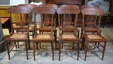Set of 8 Antique Pressed Oak Dining Chairs with Caned Seats