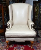Handsome Cream or Light Tan Leather Wing Chair