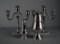 Lot of Four Silver Plate Table Service: Pair of Shefield Triple Candelabras & Two Shakers