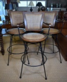 Set of Three Handsome Walnut, Rattan and Iron Swivel Bar Chairs