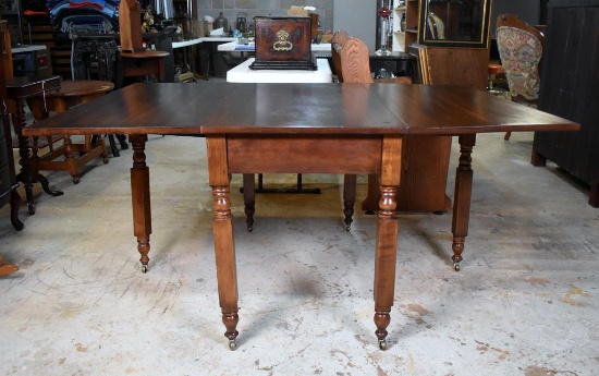 Antique Drop Leaf Cherry Dining Table with New York Legs, Brass Caster Feet