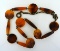 40” L Plastic Amber Lozenge and Disk Necklace