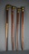 Collection of Four Brass Topped Sectional Canes