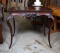 Antique Rococo Style Center Table with Graceful Cabriole Legs