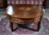 Contemporary Cherry Round Coffee Table with Sunburst Marquetry Top, Caster Feet