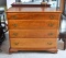 Fine 1953 Leopold Stickley Graduated Four Drawer Chippendale Style Cherry Chest